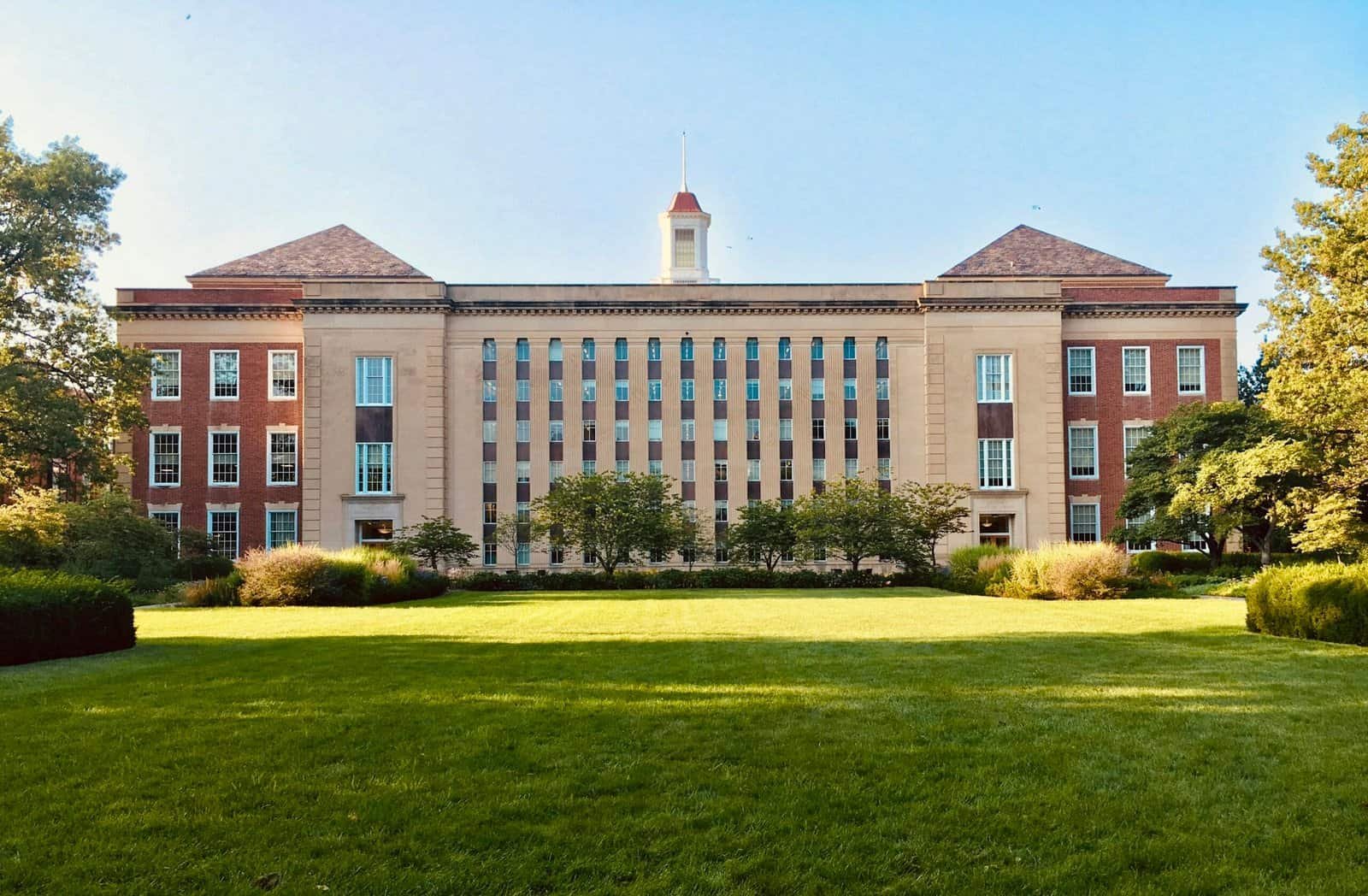 Front view of a university campus building with green lawn – Loyola University free speech news update