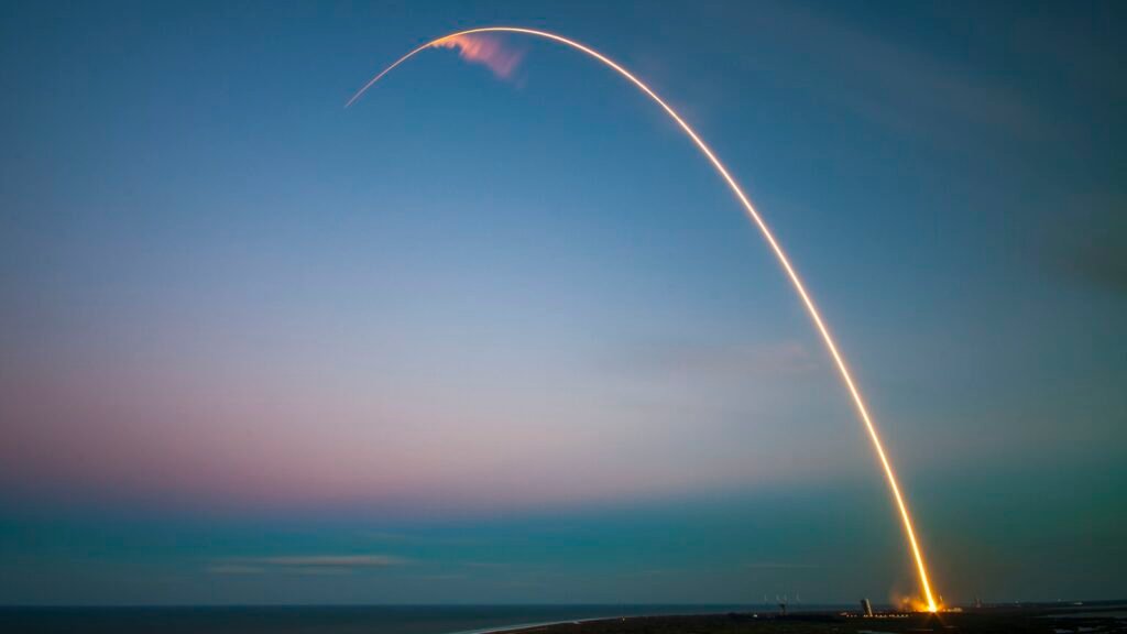 A rocket launching, representing the SpaceX public listing