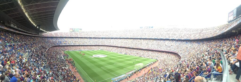 A packed soccer stadium crowd during the FIFA World Cup