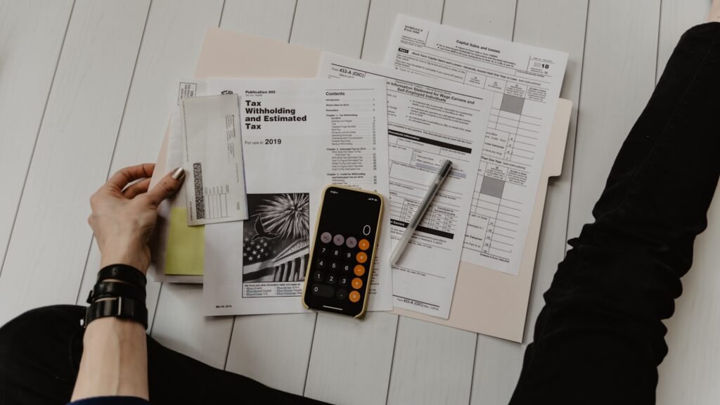 Financial documents and a calculator representing the US economy