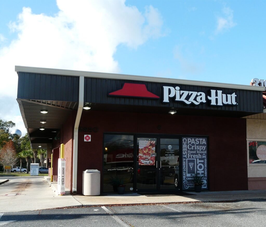 A Pizza Hut restaurant storefront, after Yum Brands sold the chain